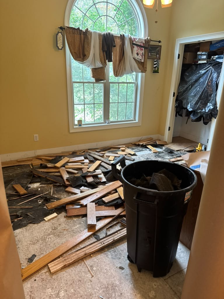 Removed flooring materials during interior demolition